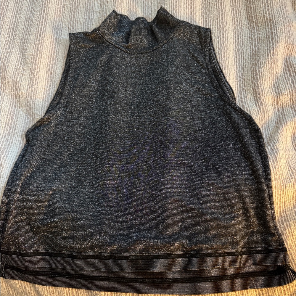Whimsy and Row silver sparkle sleeveless mock turtle neck shirt.